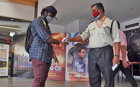 A viewer entering Aries Plex SL Cinemas in Thiruvananthapuram on Wednesday. (Photo | B P Deepu, EPS)