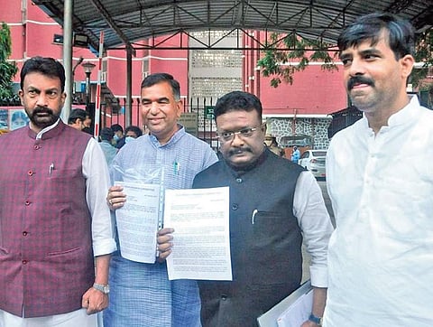 Senior Congress leaders show the formal representation seeking the cancellation of the Huzurabad byelection they submitted to the CEC. (Photo | Express)