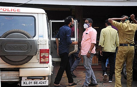 Monson Mavunkal being brought to his residence in Kochi for evidence collection in connection with a cheating case on Tuesday. (Photo | A Sanesh, EPS)