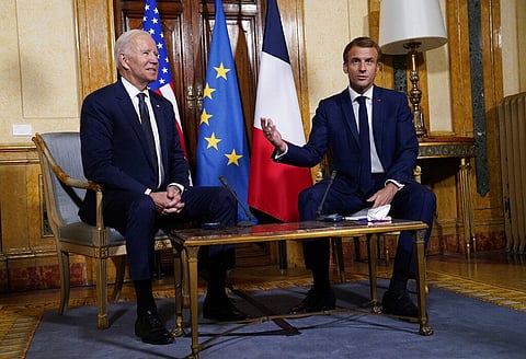 U.S. President Joe Biden, left, speaks with French President Emmanuel Macron during a meeting at La Villa Bonaparte in Rome (Photo | AP)