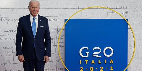 U.S. President Joe Biden poses for a photograph as he arrives at the La Nuvola conference center for the G20 summit in Rome, Saturday, Oct. 30, 2021. (Photo | AP)