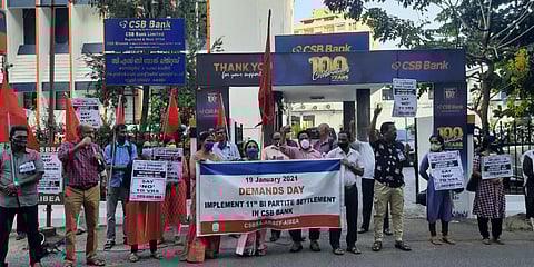 CSB Bank Staff Association hold a demo strike in front of the bank's head office. (Photo| Twitter/ @TmbeuU)