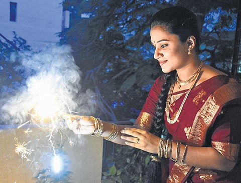Discard used fireworks in a bucket of water so people don’t step on them