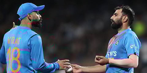 Indian skipper Virat Kohli (L) and pacer Mohammed Shami. (File photo| AFP)