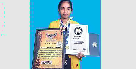 Audipudi Devisri with the Guinness Book of Records certificate | Express