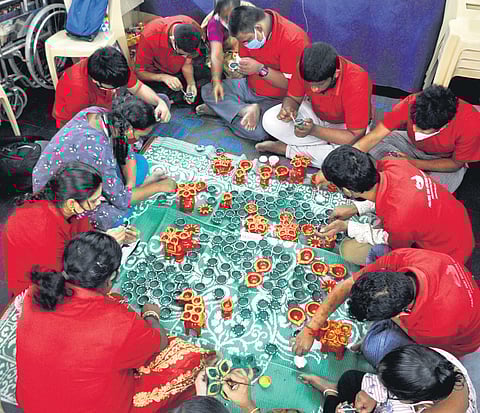 Special children at the Prajwal Vani Welfare Society paints diyas ahead of Diwali in Visakhapatnam | G satyanarayana