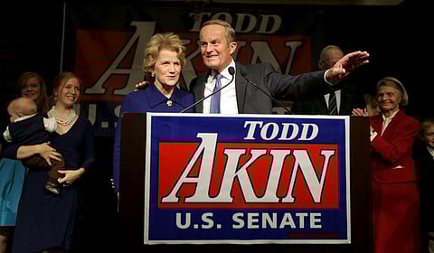 U.S. Senate candidate, Rep. Todd Akin, R-Mo., and his wife Lulli acknowledge supporters before Akin makes his concession speech. (File photo | AP)