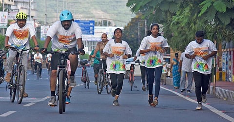 People take part in cycling and walking as part of Azadi Ka Amruth Mahotsav in Vijayawada on Sunday. (Photo | P Ravindra Babu, EPS)