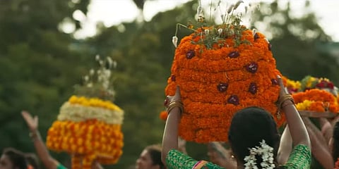 A woman with bathukamma (Photo | YouTube screengrab)