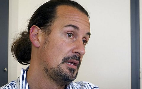 Olivier Savignac, President of 'Parler et revivre' (Speak out and live again) victims association speaks during an interview Monday in Paris. (Photo | AP)