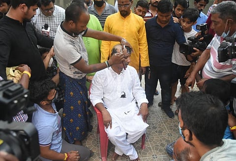 Surma MLA Asish Das getting his head tonsured. (Photo | Special arrangement)