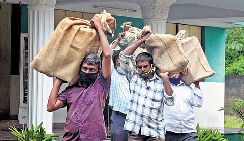 Election workers carry ballot boxes ahead of the polls, in Vellore on Tuesday | S Dinesh