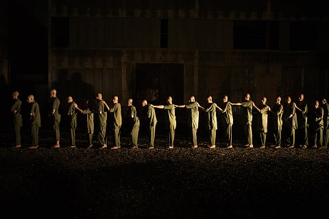 Drug users detained during a Taliban raid walk in line on their way to the detoxification ward of the Avicenna Medical Hospital for Drug Treatment in Kabul, Afghanistan, Saturday, Oct. 2, 2021. (AP)