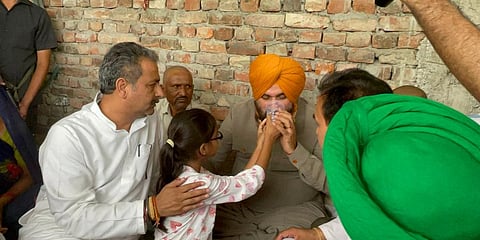 Navjot Sidhu breaking his fast after Union Minister Ajay Mishra's son Ashish Mishra appeared before UP government SIT on Saturday, Oct 9. (Photo | Twitter, Navjot Sidhu)