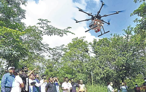 A ‘seedcopter’ by Marut Drones at ‘Hara Bahara’, India’s first aerial seeding campaign at Hyderabad’s KBR park.