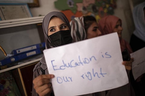 Women, teachers and students demonstrate inside a private school to demand for their rights. (File Photo | AP)