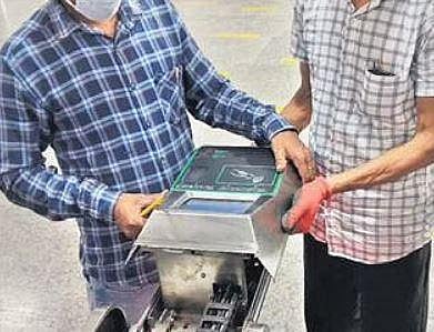 Scanners being installed at a Metro station to accept the new cards
