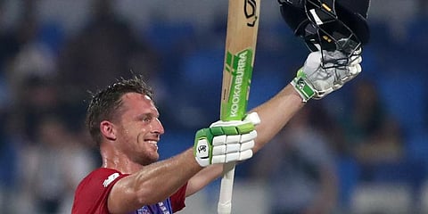 England's Jos Buttler celebrates after scoring a century during the Cricket Twenty20 World Cup match against Sri Lanka. (Photo | AP)