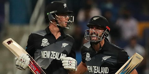 New Zealand's Daryl Mitchell, right, and Mitchell Santner celebrate winning the Cricket Twenty20 World Cup semi-final match against England in Abu Dhabi, UAE, Nov 10, 2021. (Photo | AP)