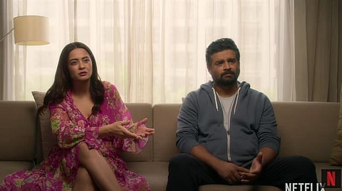 R Madhavan (R) and Surveen Chawla (L) in Netflix's 'Decoupled!' (Photo | YouTube Screebgrab)