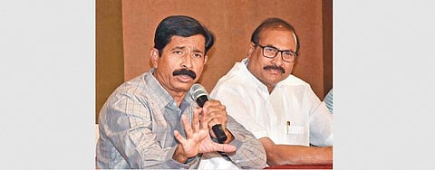 Federation of South India Rice Millers Association president T Devender Reddy speaks to the media  in Hyderabad on Wednesday | R V K Rao