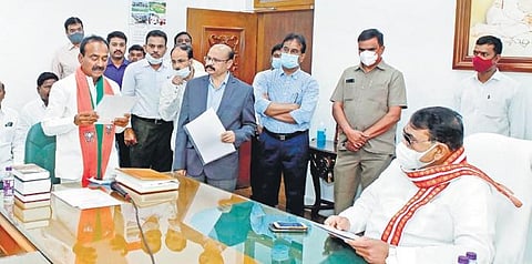 BJP leader Eatala Rajender being sworn in as an MLA in Speaker Pocharam Srinivas Reddy’s chambers, in Hyderabad, on Wednesday