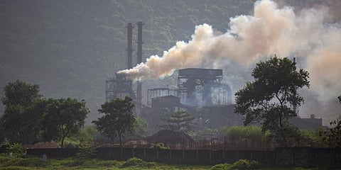 Smoke rises from a coal-powered steel plant at Hehal village near Ranchi, in eastern state of Jharkhand. (Photo | AP)