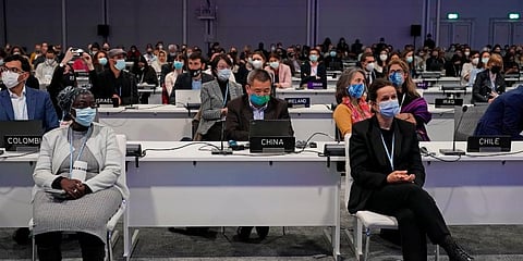 Delegates pack the hall at the COP26 U.N. Climate Summit in Glasgow, Scotland. (Photo | AP)