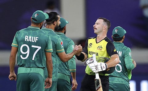 Australia's Matthew Wade greets Pakistan's cricketers after winning the Cricket Twenty20 World Cup semi-final match. (Photo | AP)