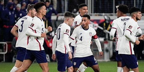 US forward Christian Pulisic (10) celebrates with teammate Tyler Adams (4) after scoring. (Photo | AP)