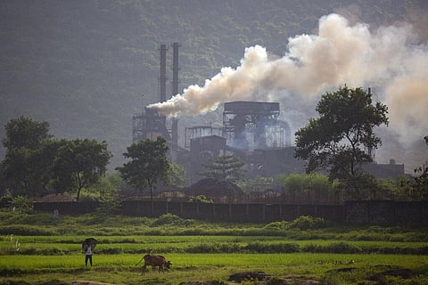 Smoke rises from a coal-powered steel plant at Hehal village near Ranchi, in eastern state of Jharkhand. (Photo | AP)