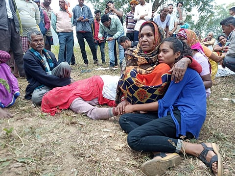 Relatives in mourning in Malkhedi village (Photo | Special arrangement)