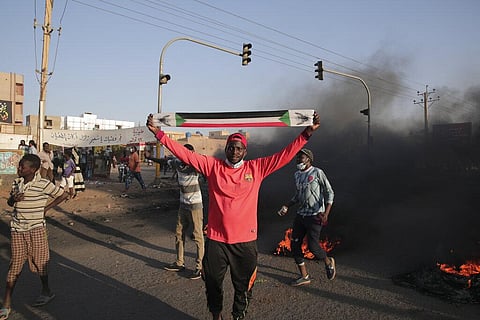 People protest in Khartoum, Sudan, Saturday, Nov. 13, 2021. Pro-democracy protesters took to the streets across Sudan to rally against the military's takeover last month.  (Photo | AP)