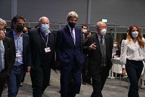 Delegates before the closing plenary session at the COP26 U.N. Climate Summit, in Glasgow, Scotland, Saturday, Nov. 13, 2021. (Photo | AP)