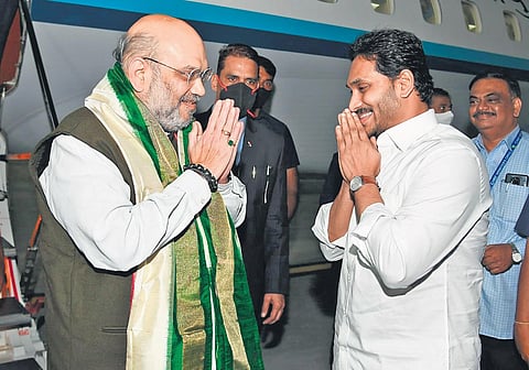 Union Home Minister Amit Shah being received by Chief Minister YS Jagan Mohan Reddy at the Renigunta airport on Saturday night | Express