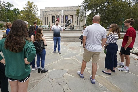Future students take a tour of the Indiana University campus Oct. 14, 2021, in Bloomington, Ind. (Photo | AP)