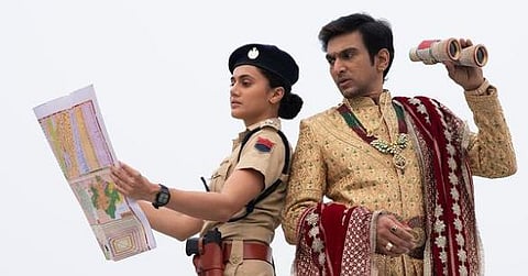 In the photo, Taapsee Pannu is looking at a map while Pratik Gandhi poses with a pair of binoculars in his hand. (Photo | Instagram)