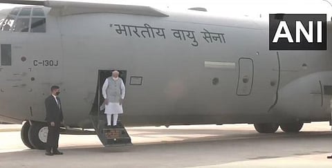 PM Modi gets out of the IAF C-130 Hercules plane after landing on the Purvanchal expressway. (Photo | Twitter/ANI)