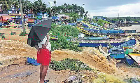 Fishing boats at Vizhinjam in Thiruvananthapuram seen damaged on Monday following incessant rain | Vincent Pulickal
