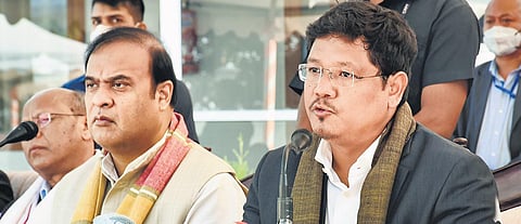 Himanta Biswa Sarma (left) and Conrad Sangma jointly address a press meet. (Photo | PTI)