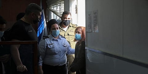 Juana Ruiz Sanchez accused of raising money for a banned Palestinian militant group, is brought to a courtroom for sentencing, at the Israeli Ofer military base near the West Bank city. (Photo | AP)