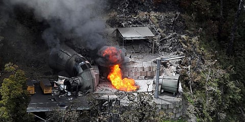 Flames burn from a ventilation shaft above the Pike River mine on Nov. 30, 2010, where 29 miners are fatally trapped, in Greymouth, New Zealand. (File Photo | AP)