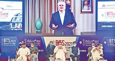 Australian PM Scott Morrison addresses delegates at the Bengaluru Tech Summit, via video conference on Wednesday, as Vice-President Venkaiah Naidu, Governor Thaawarchand Gehlot and CM Basavaraj Bommai