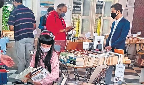 Patrons at The Great Book Giveaway organised by  The Community Library Project at South Extension. (Photo| EPS)