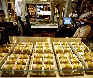 Gold slips Rs 80; silver up Rs 600