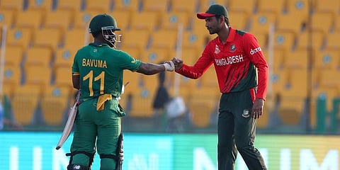 South Africa's Temba Bavuma, left, and Bangladesh's captain Mohammad Mahmudullah gesture to each other following their ICC T20 World Cup match in Abu Dhabi, UAE, Tuesday, Nov. 2, 2021. (Photo | AP)