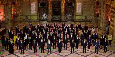 World leaders pose for a group photo during an evening reception to mark the opening day of the COP26 UN Climate Summit, in Glasgow. (Photo| AP)