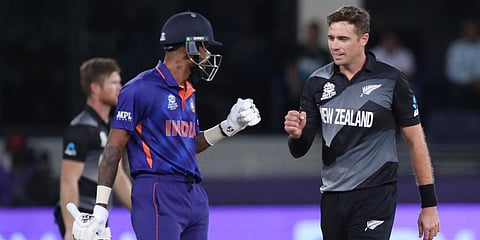 New Zealand's Tim Southee, right, gives a fist touch to India's Hardik Pandya during their ICC T20 World Cup match in Dubai, UAE, Sunday, Oct. 31, 2021. (Photo | AP)