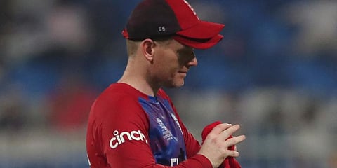 England captain Eoin Morgan wipes the ball during a Twenty20 World Cup match. (Photo | AP)