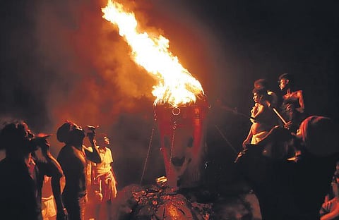 The Maha Deepam was lit atop the 2,668 ft Annamalai Hill